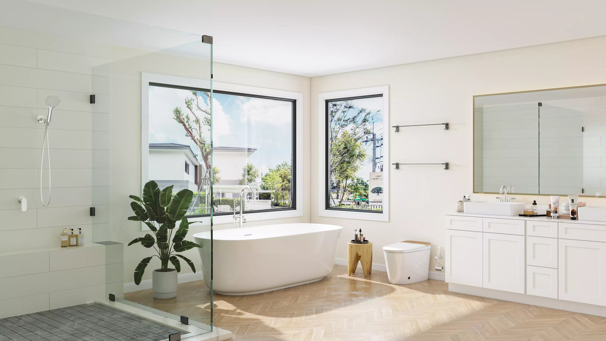 A modern, spacious bathroom featuring a glass-enclosed shower, freestanding bathtub, white vanity, and large windows that let in natural light, creating a serene and elegant atmosphere.